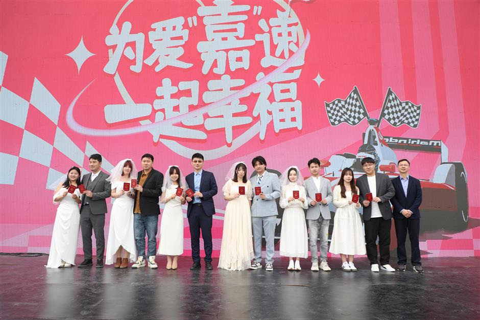 six couples exchange wedding vows at chinese gp circuit